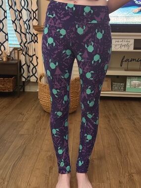 Women’s LulaRoe Disney Purple Patterned Leggings with Teal Print